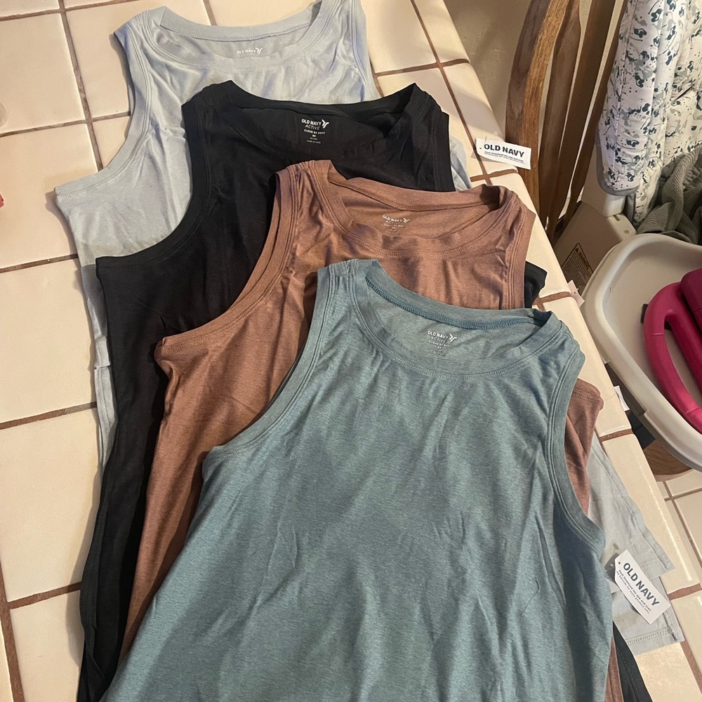 Old Navy active shirt size xs. 4 different colors. Selling them together.